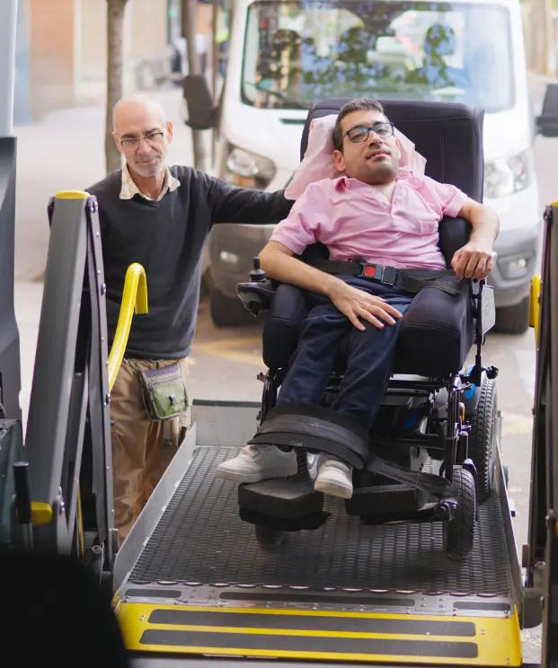 Wheelchair patient boarding accessible medical transport van using ramp