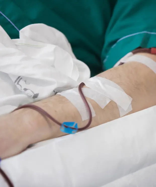 Dialysis patient receiving treatment supported by medical transportation service